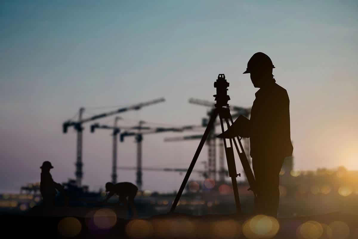 Surveyor on construction site