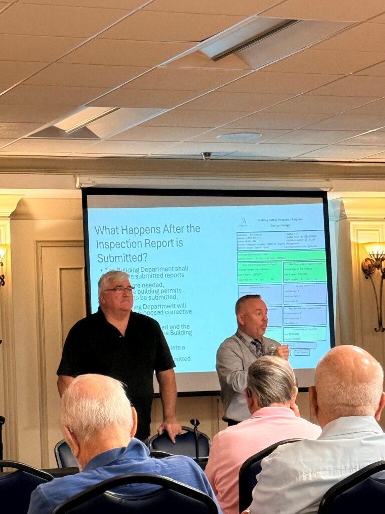Pembroke Pines Building Department team members speaking with Century Village residents during a community outreach meeting in South Florida